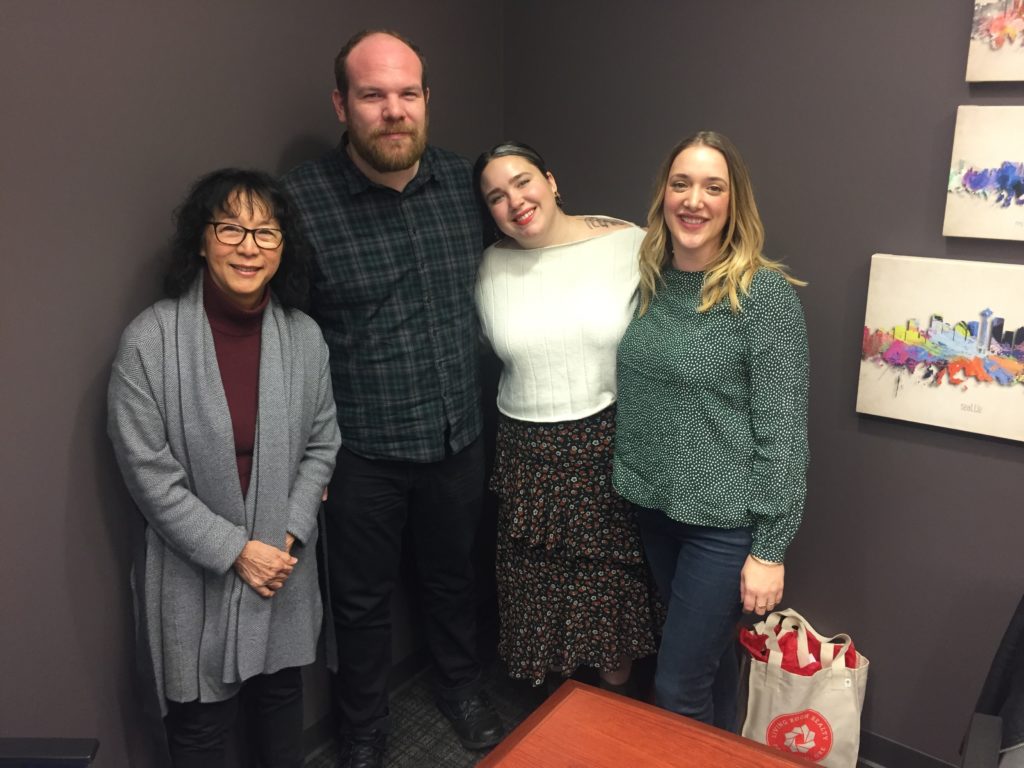 First time buyers, Catie and Greg, with their agent, Mel Marzahl, and mortgage broker