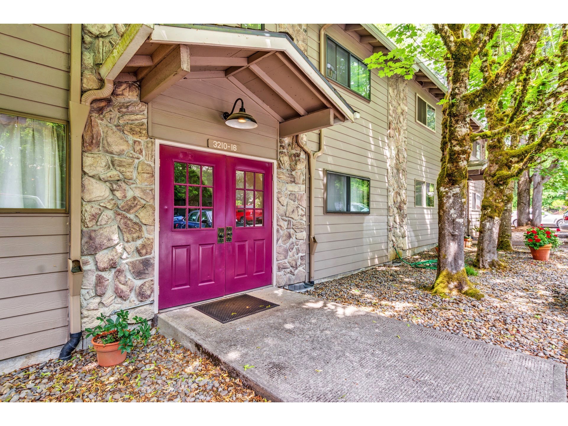 Just Listed! Multnomah Village Condo with Treehouse Feel Living Room Realty