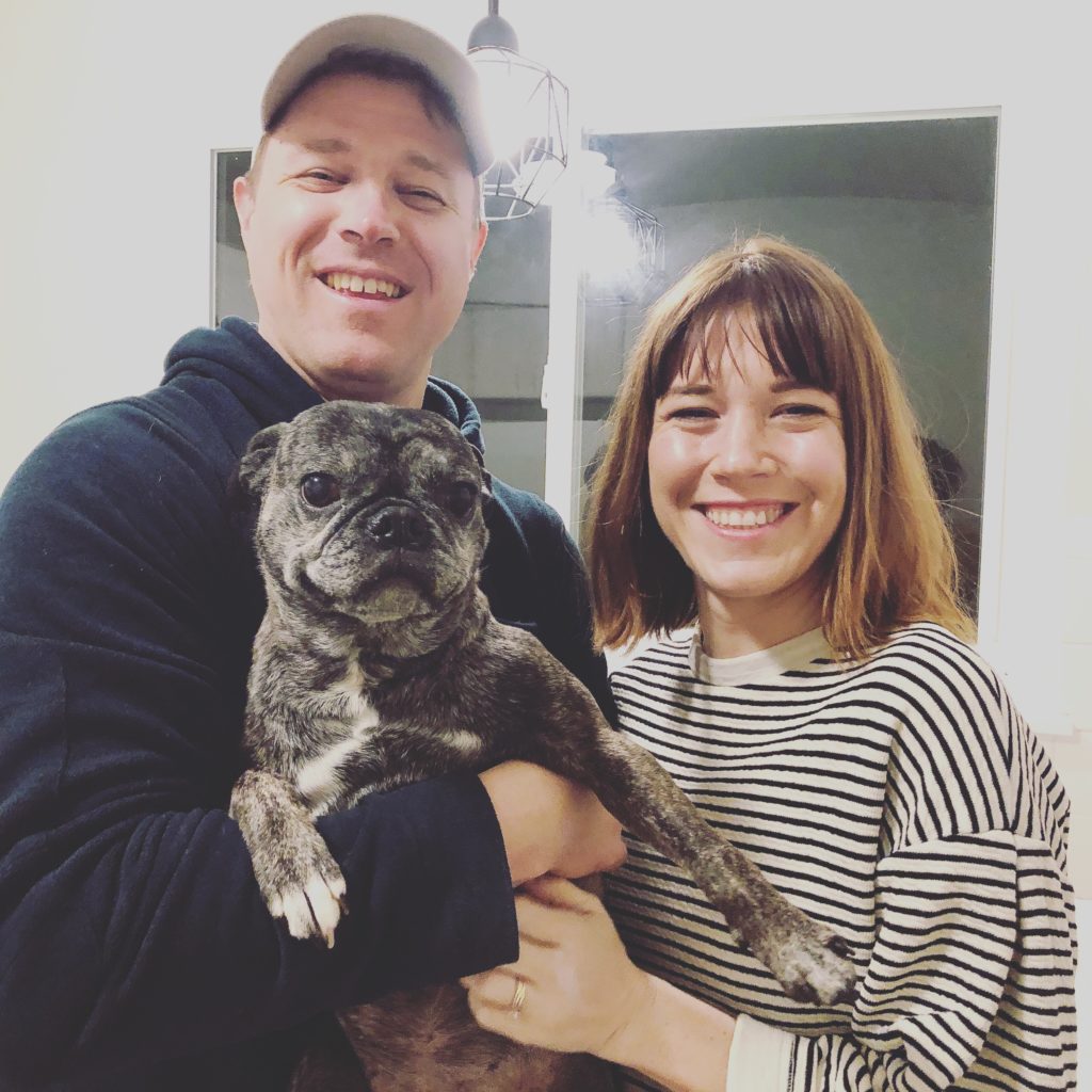 happy new buyers with cute dog