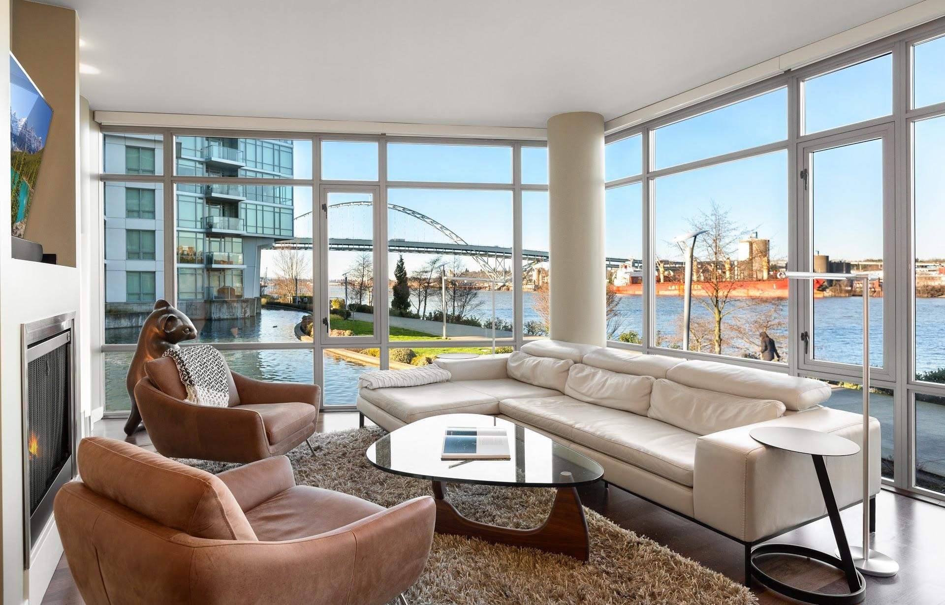 JUST SOLD! Stunning Waterfront Pearl Condo Living Room Realty