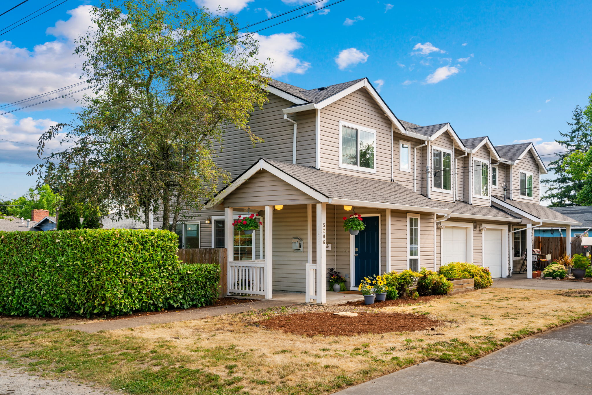 Just Listed! Refreshed Corner Townhouse in Prime NE Location